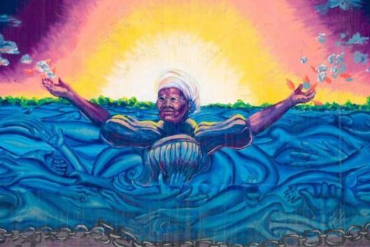 在那里 is a colorful, uplifting mural of Mary Meachum at the Underground Railroad site 在2022世界杯投注.